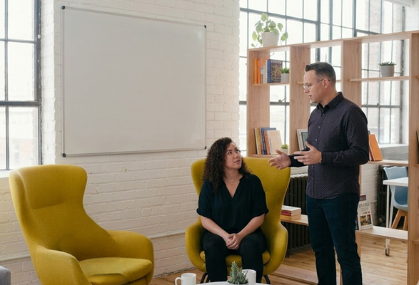 Tyler-and-Jess-chatting-about-Local-SEO-Clients