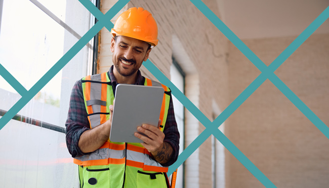 Happy local service business owner reviewing citations on a tablet