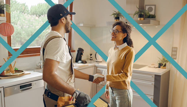Local-Digital-Marketing-Services-Built-for-Home-Service-Businesses Home service contractor shaking hands with a satisfied homeowner in a kitchen